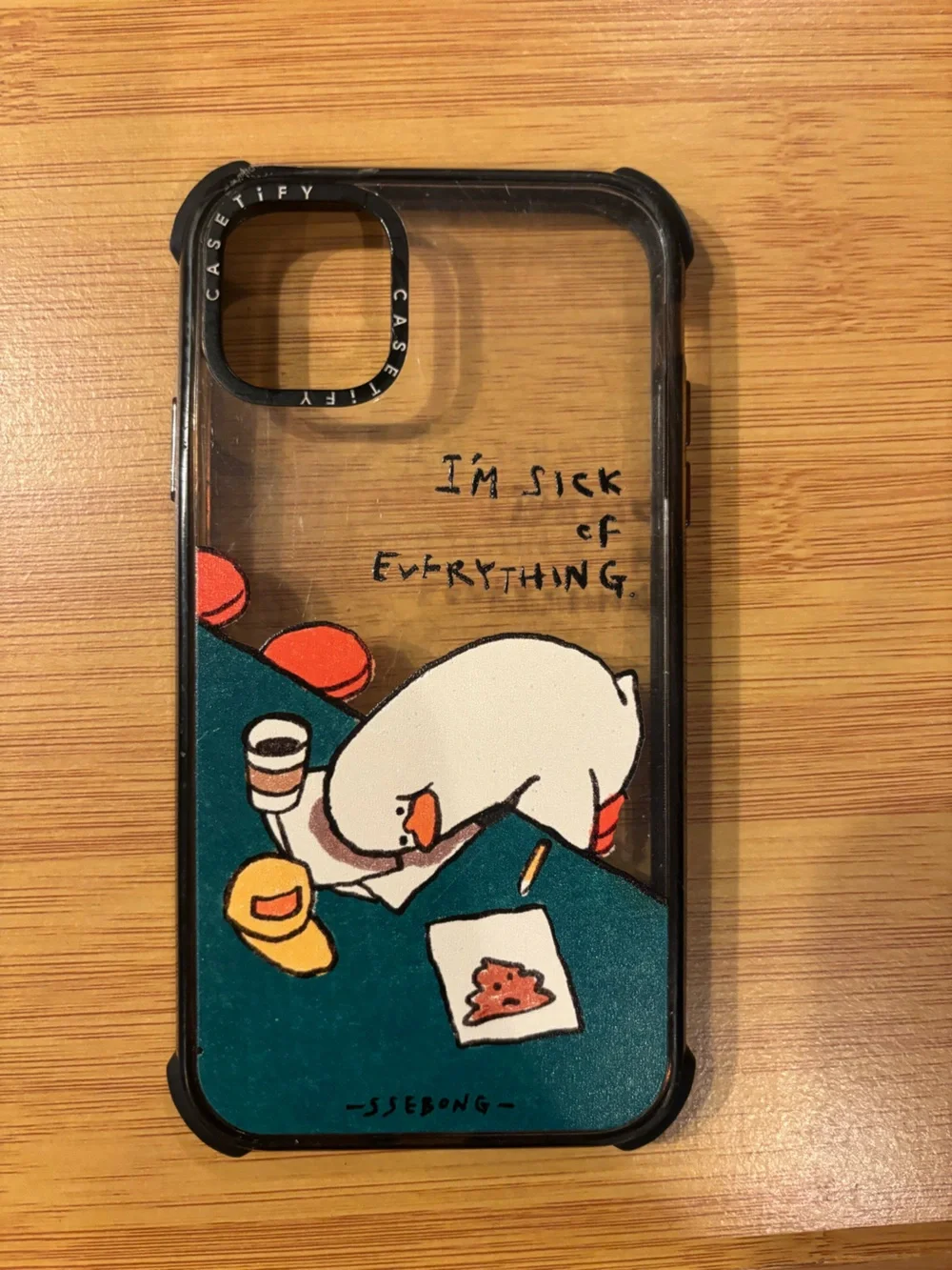 Casetify Clear Case with Teal Illustration and Accent Orange Details